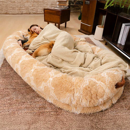 Extra Big Plush Dog and Person Bed in khaki with a woman and a Shiba Inu sleeping inside