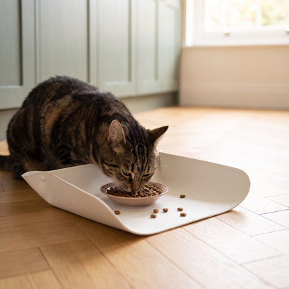 Easy Clean Pet Food Mat Tray – cat eating from bowls on the mat in a kitchen