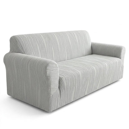 Stretch jacquard pet sofa cover in light grey on a three-seat sofa, plain white background